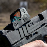 Close-up of MERCURY Reflex Sight side controls and body detail